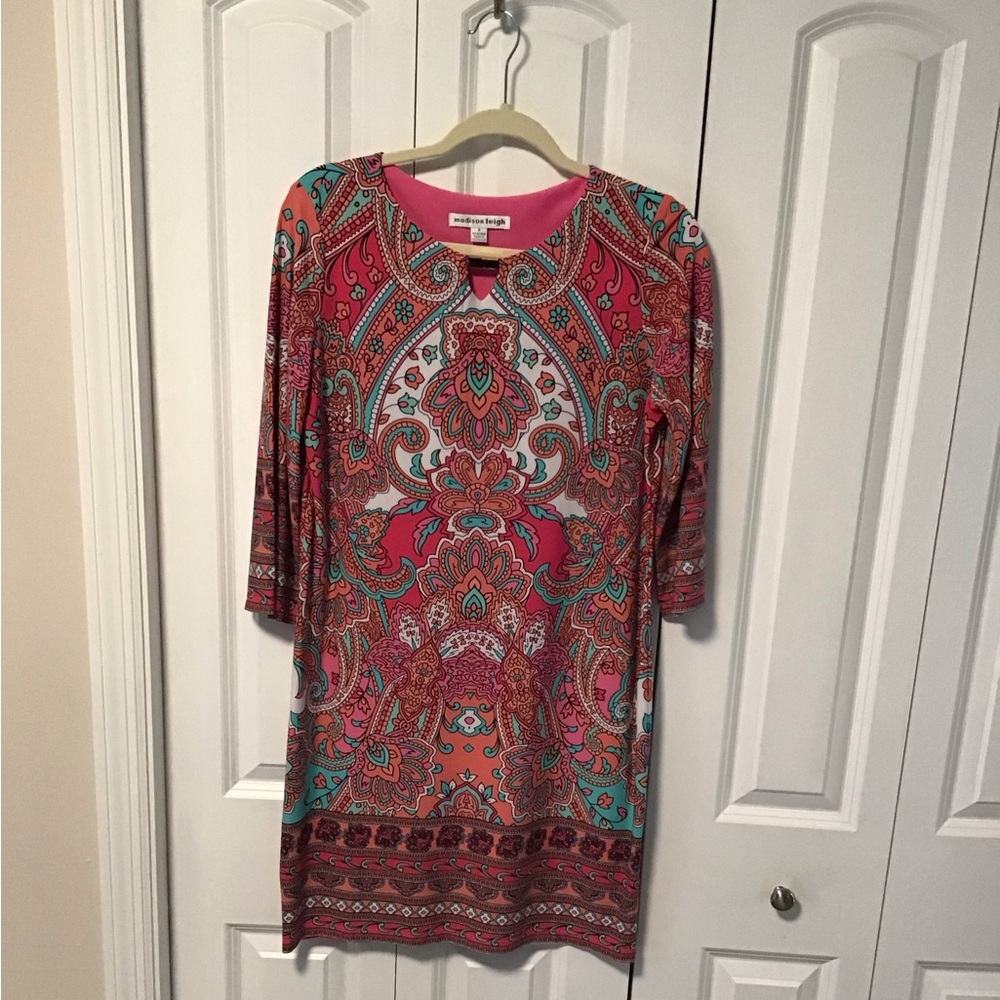 Easy to wear dress. 3/4 sleeves and the dress length is at the knee